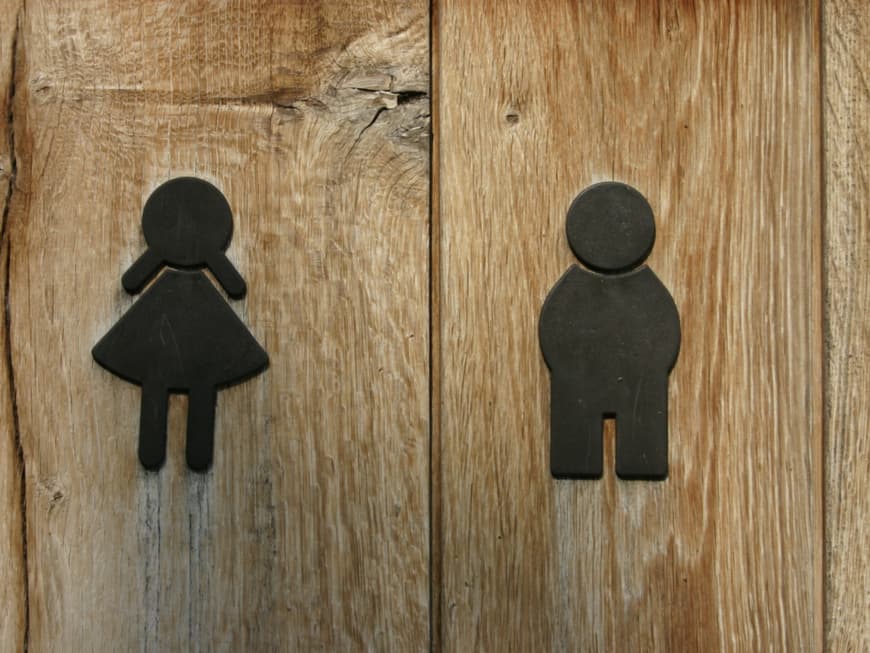 Toilettentür mit Mann-Frau-Zeichen