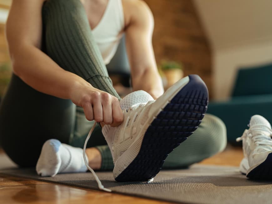 Laufschuhe anziehen